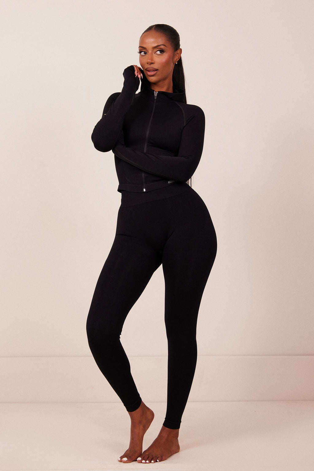 The Mars Seamless Hooded Zip Jacket in Black