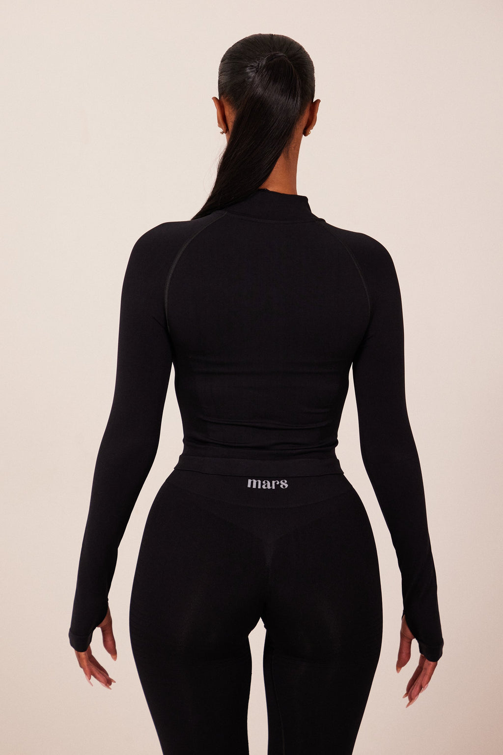 The Mars Seamless Zip Jacket in Black