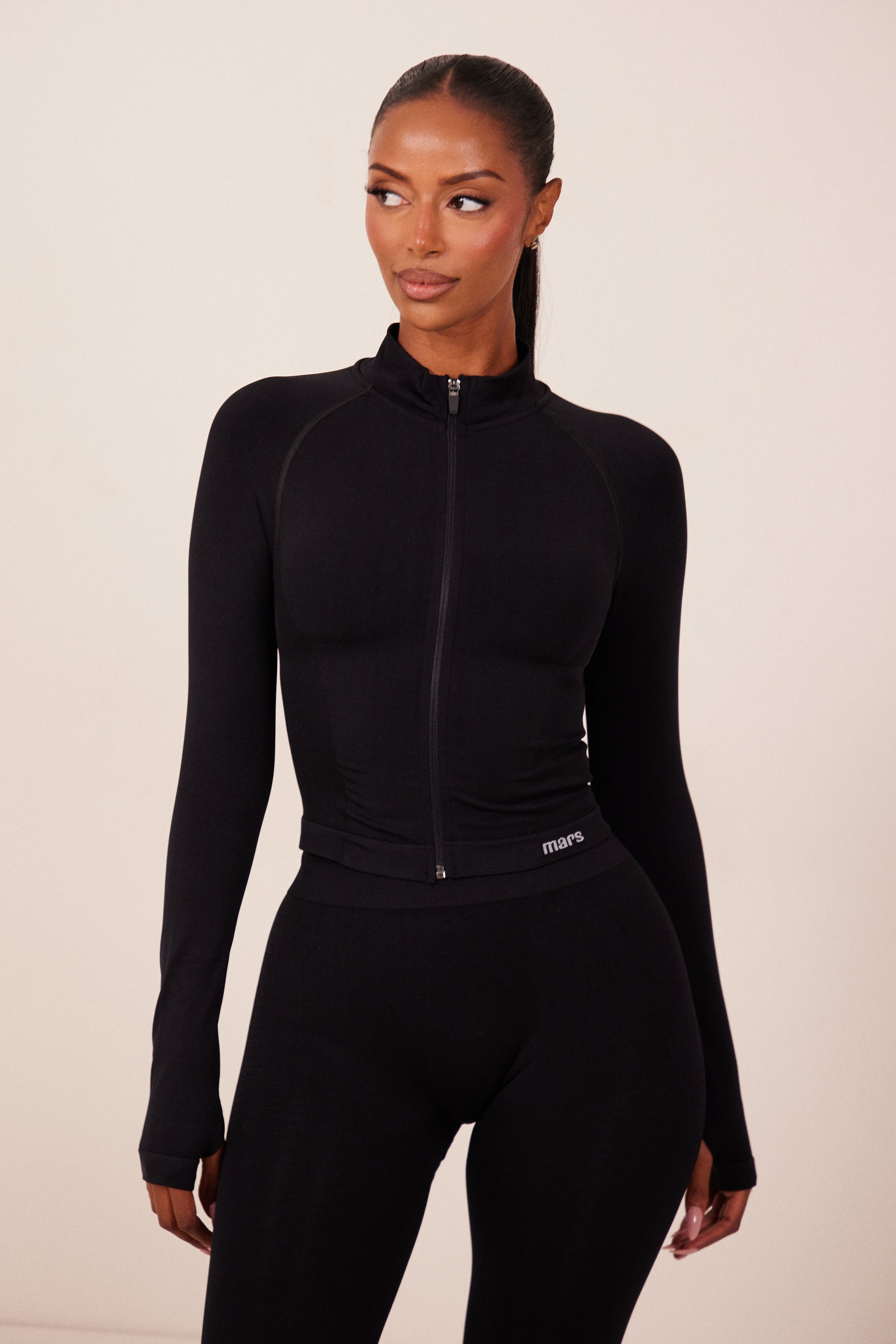 The Mars Seamless Zip Jacket in Black