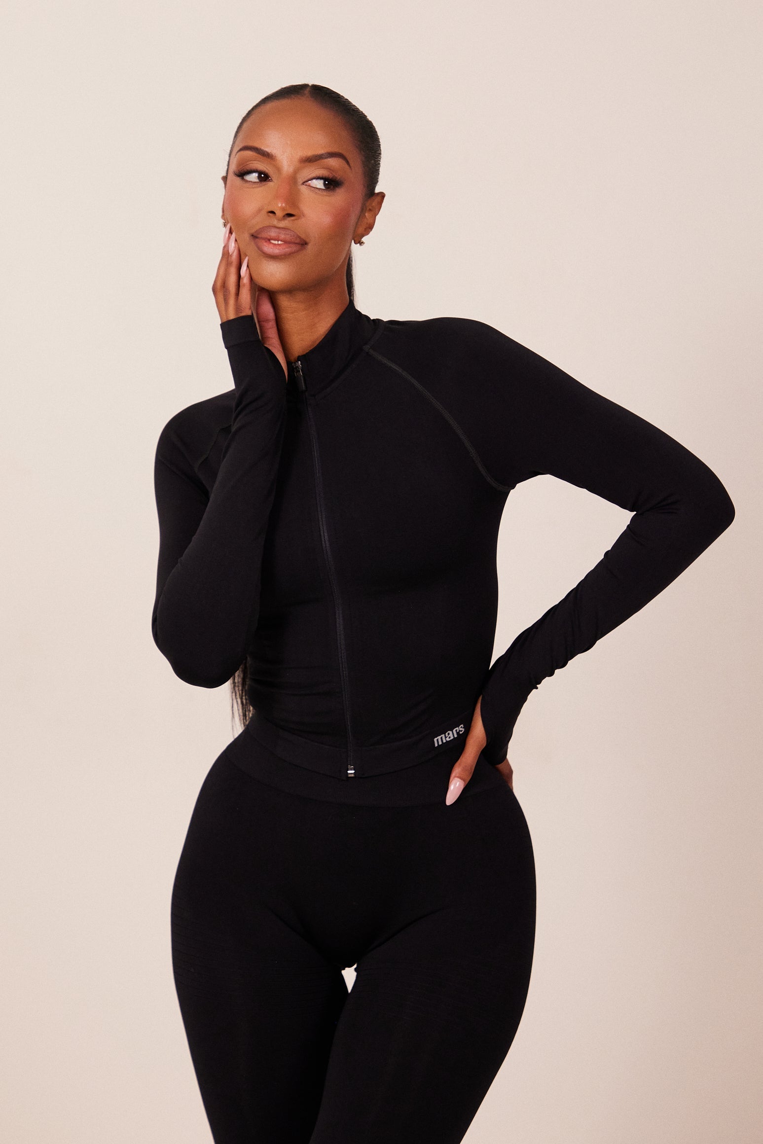 The Mars Seamless Zip Jacket in Black