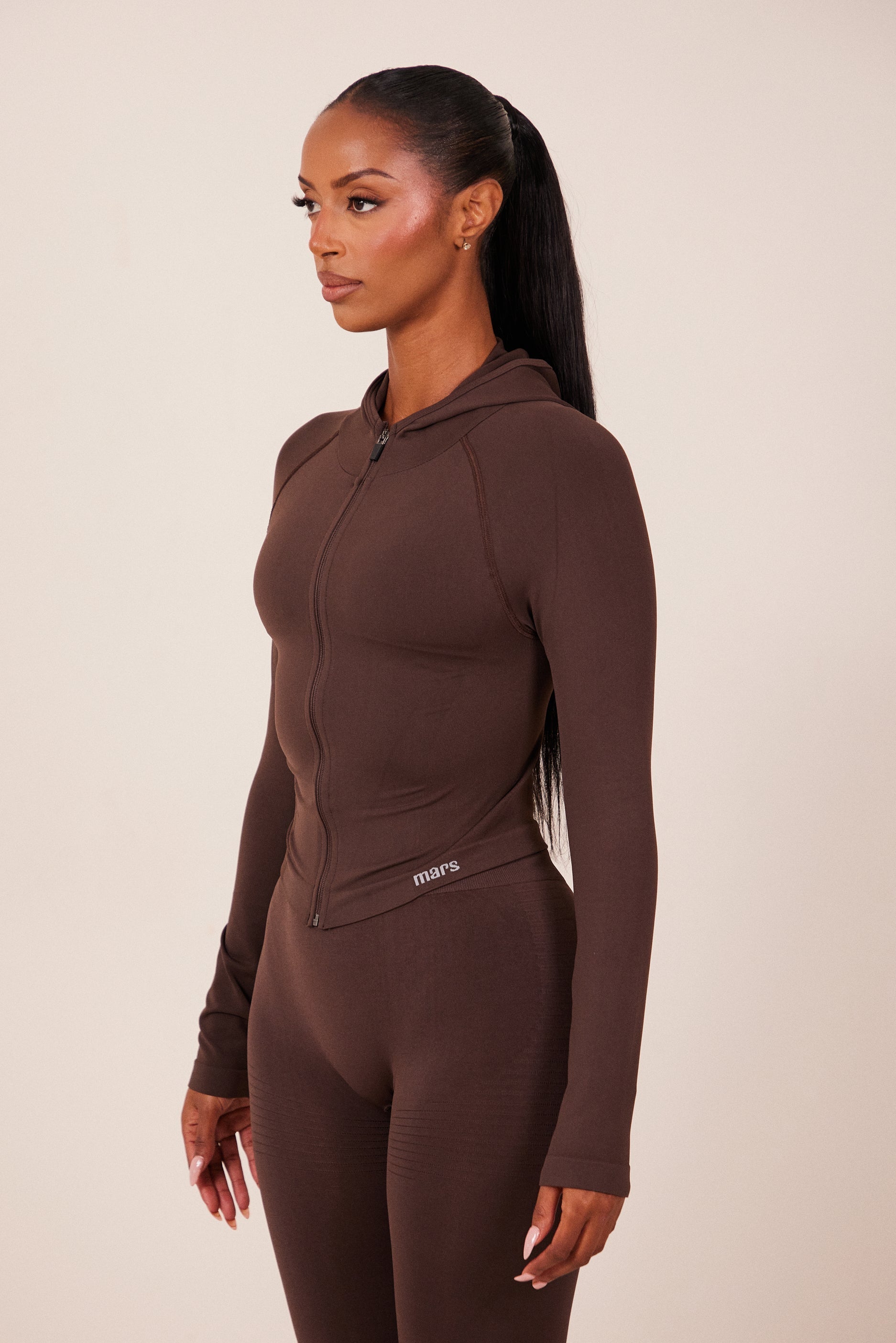 The Mars Seamless Hooded Zip Jacket in Brown