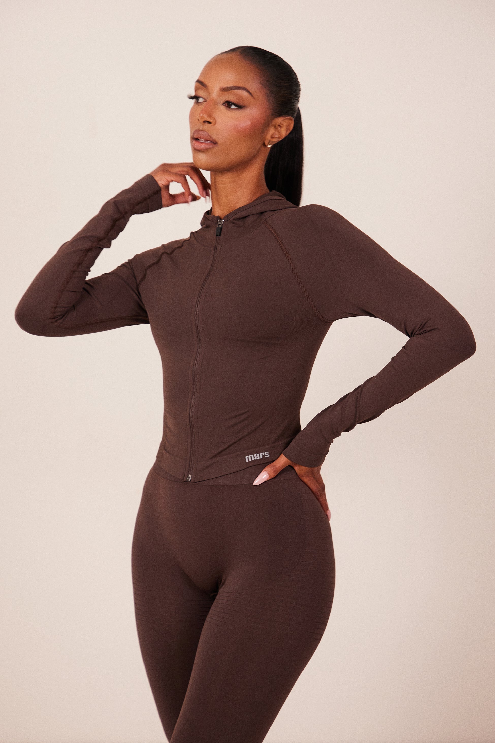 The Mars Seamless Hooded Zip Jacket in Brown