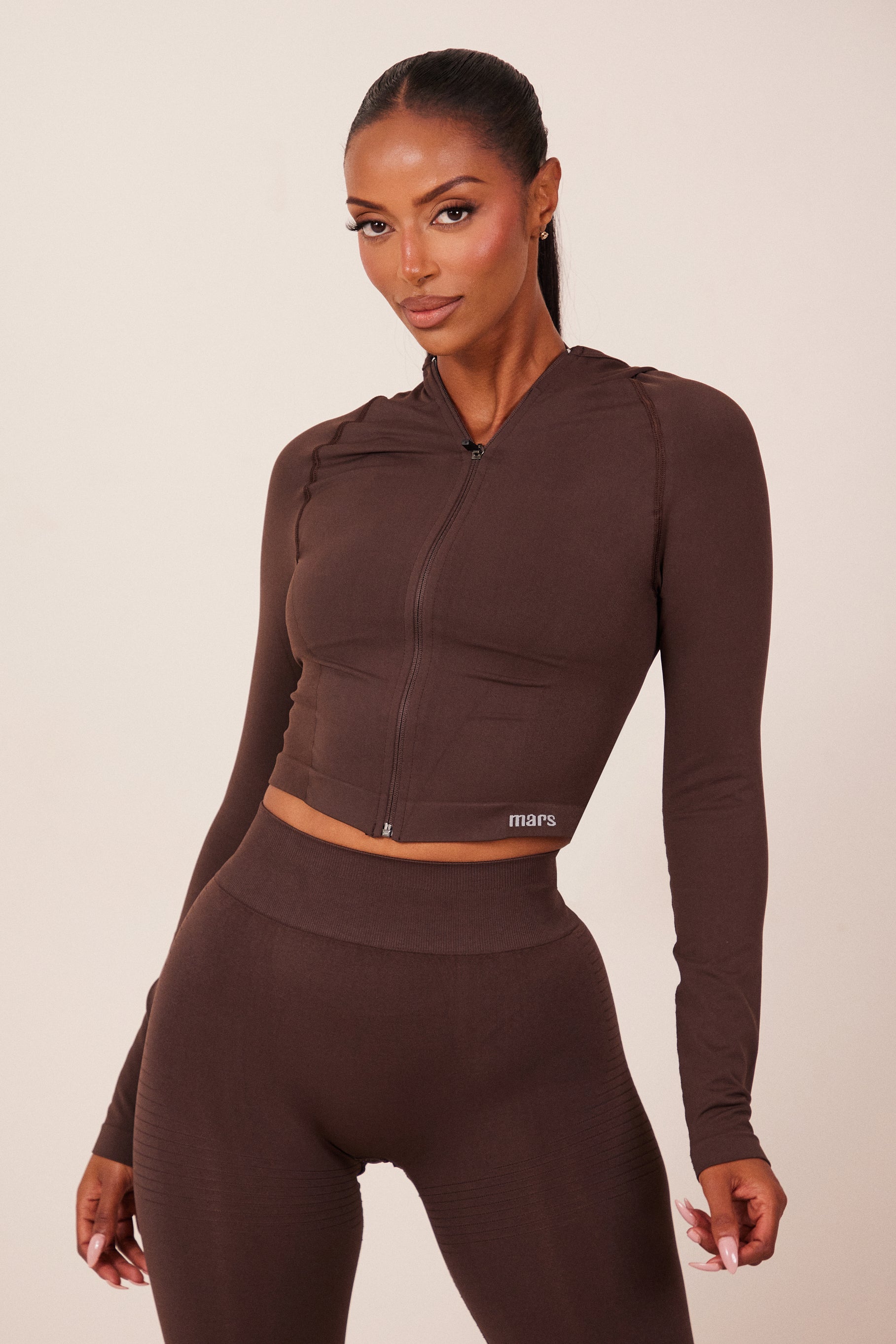 The Mars Seamless Hooded Zip Jacket in Brown