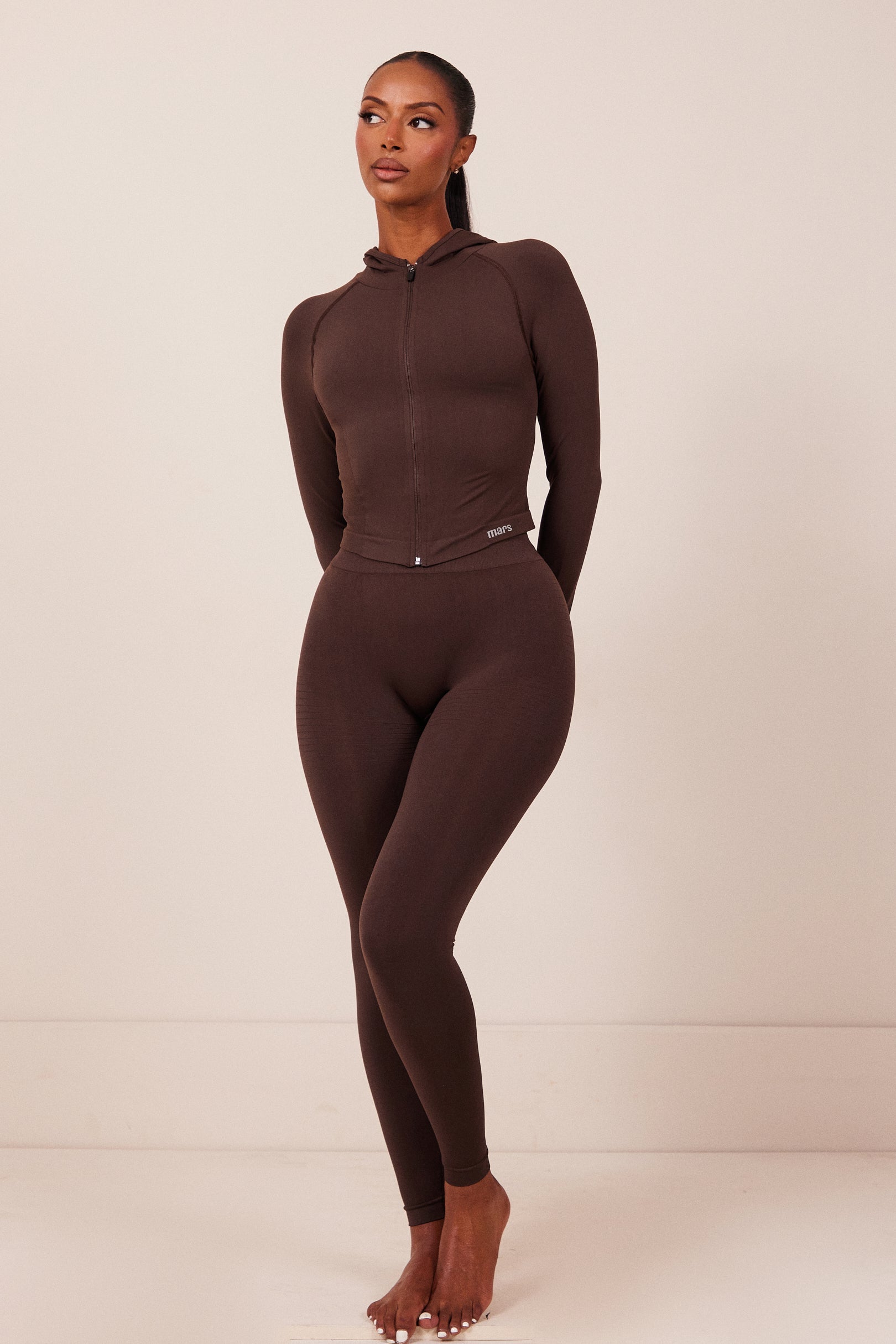 The Mars Seamless Hooded Zip Jacket in Brown