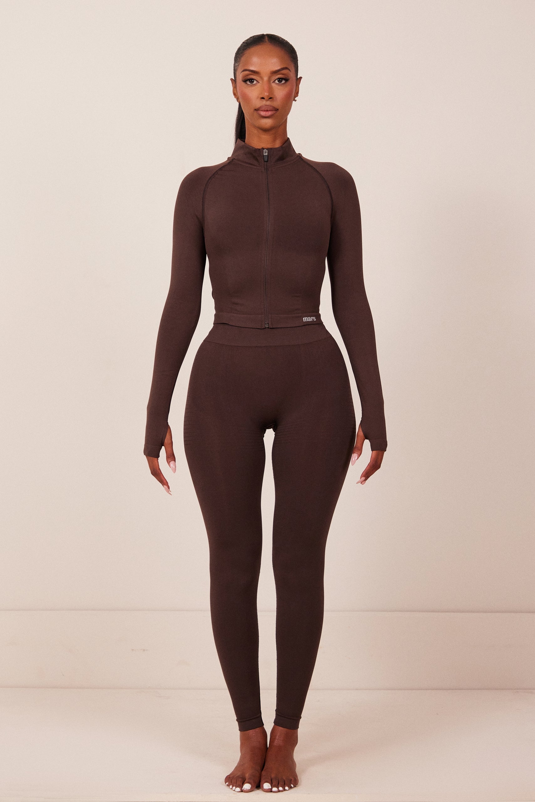 The Mars Seamless Zip Jacket in Brown