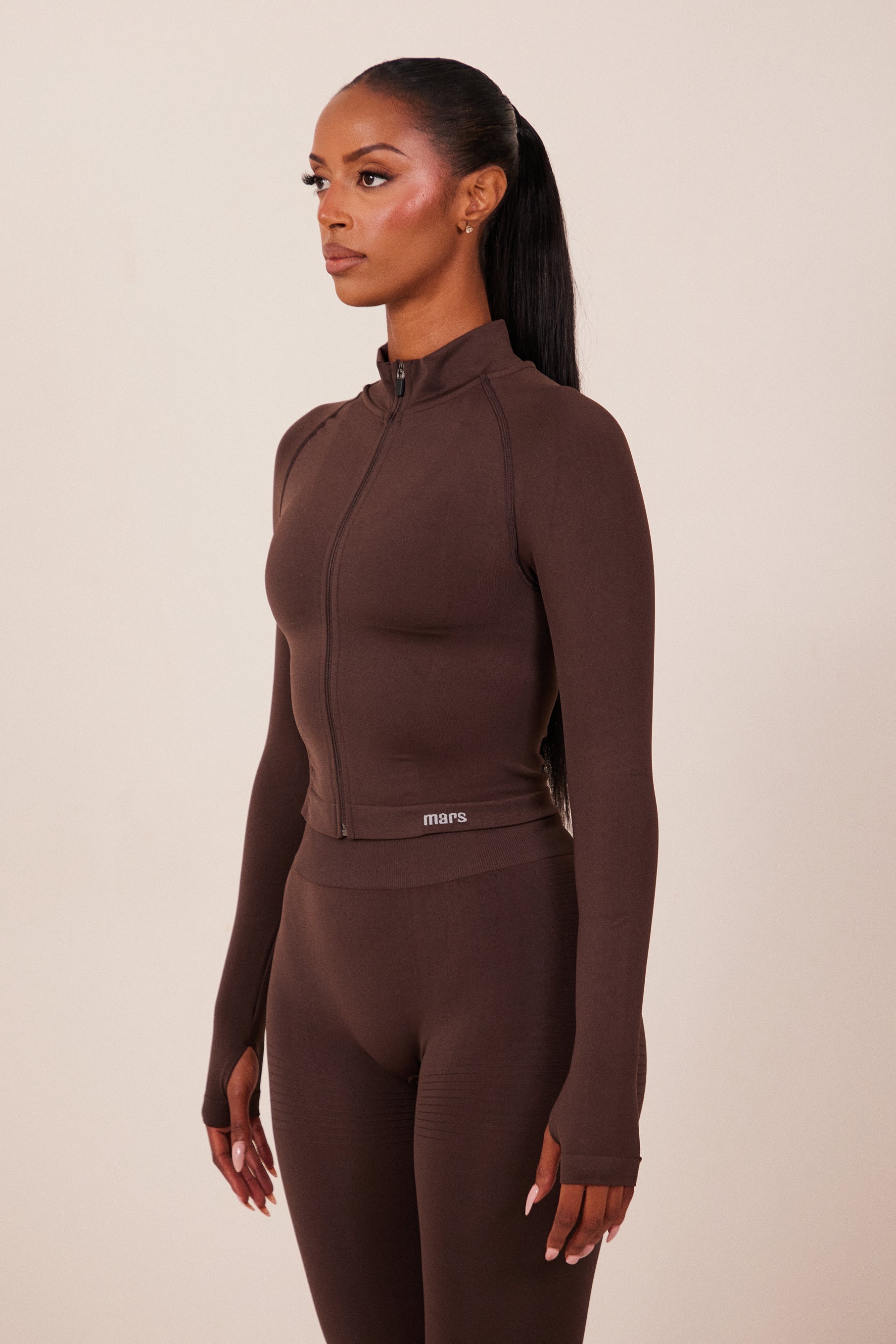 The Mars Seamless Zip Jacket in Brown