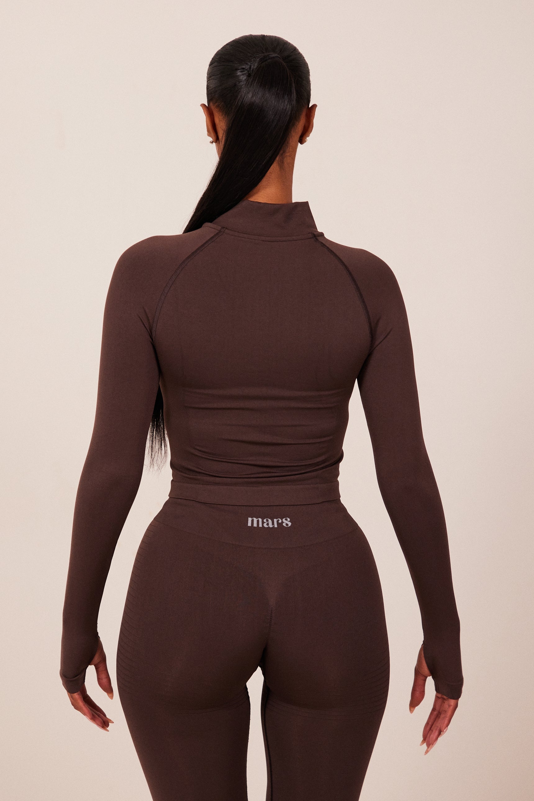 The Mars Seamless Zip Jacket in Brown