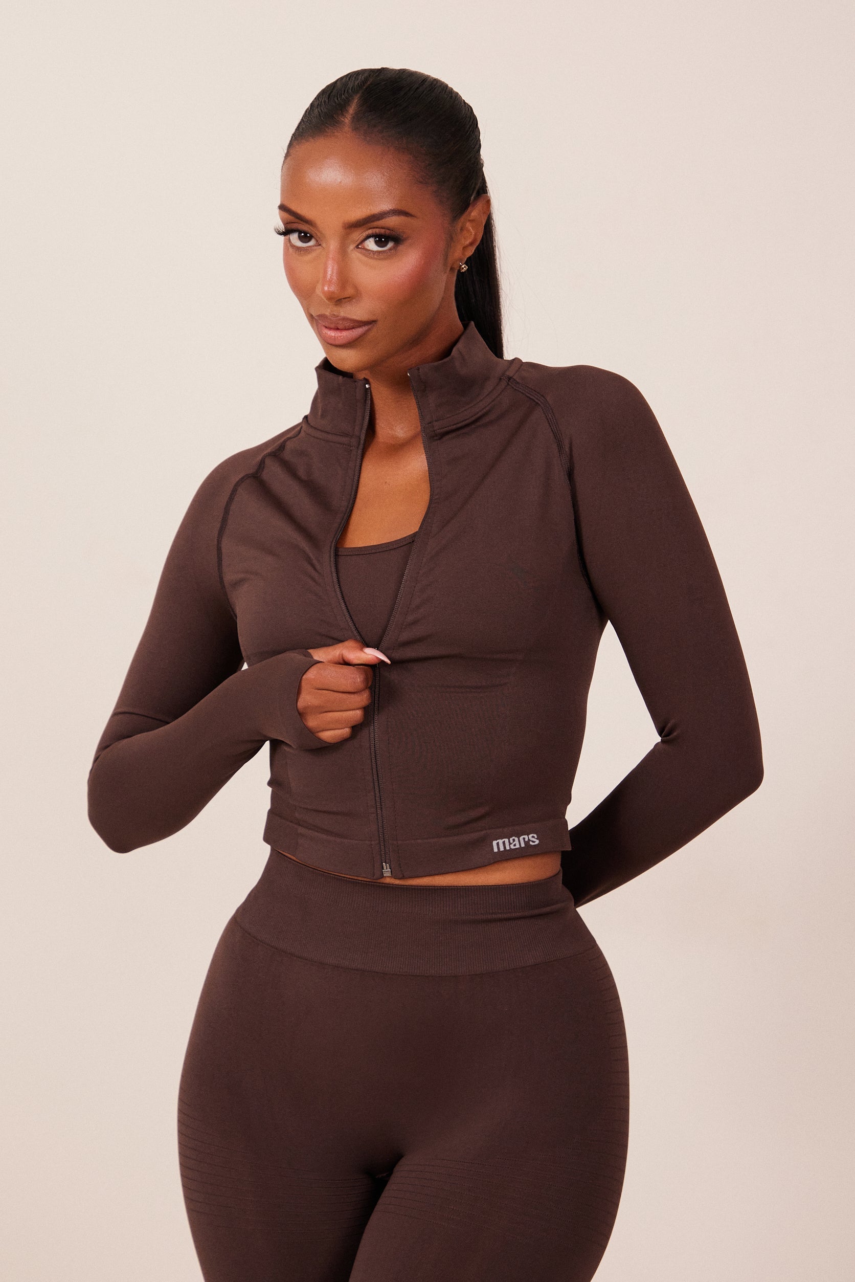 The Mars Seamless Zip Jacket in Brown