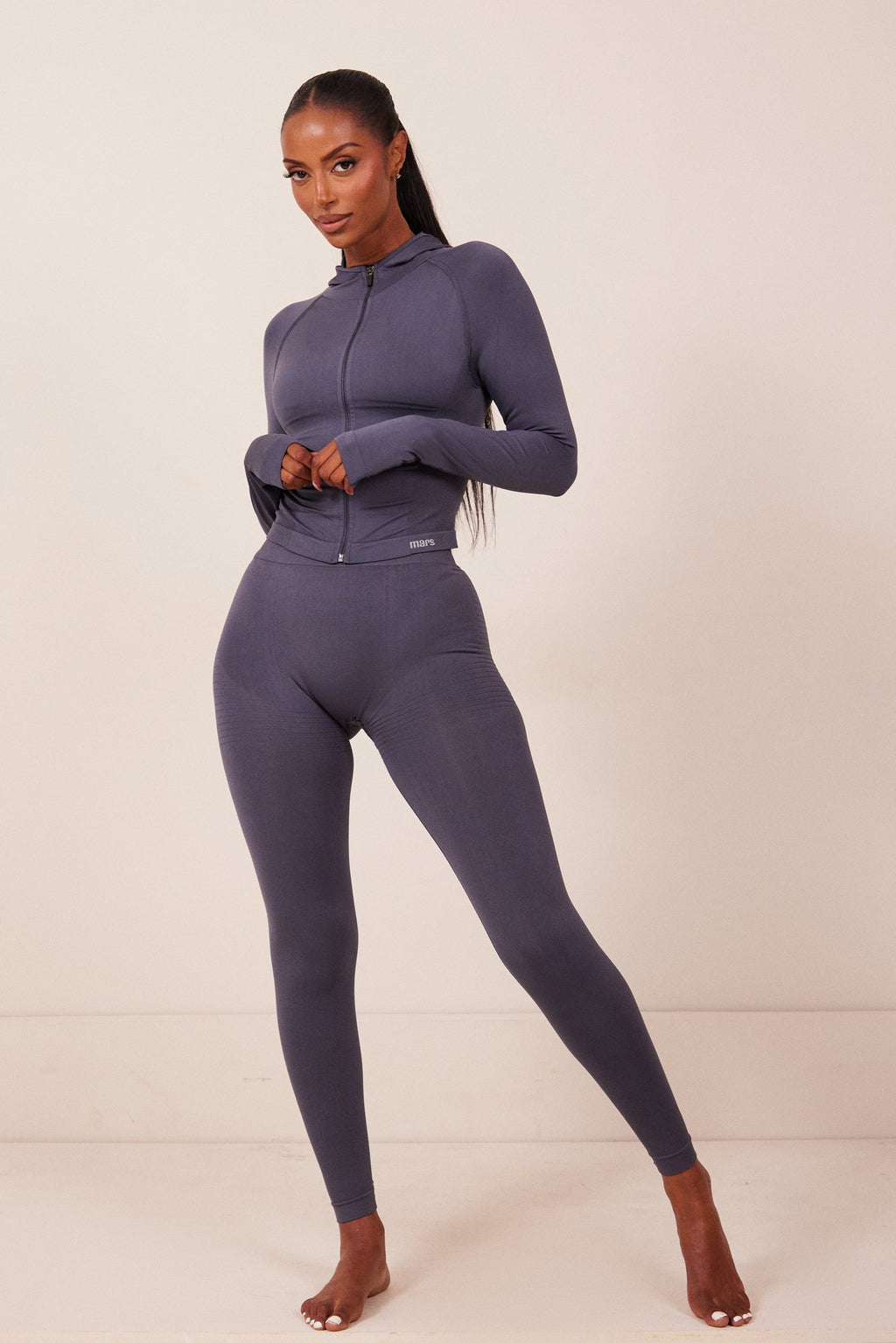 The Mars Seamless Hooded Zip Jacket in Navy