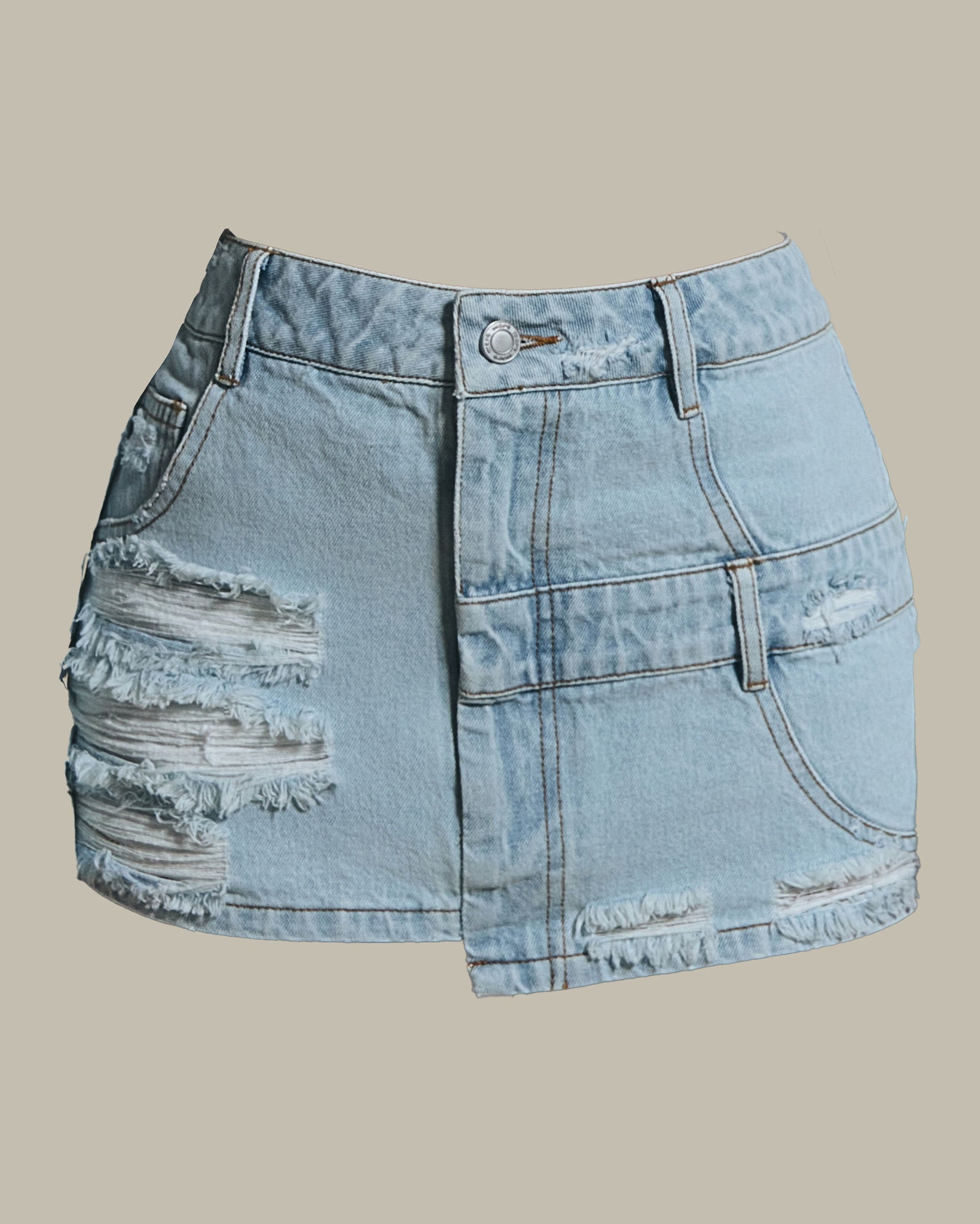 The Esha Denim Mini Skirt in Light Wash Blue