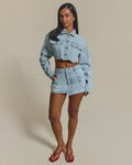 The Esha Denim Mini Skirt in Light Wash Blue